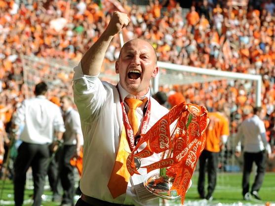Ian Holloway celebrates the first of his two Championship play-off wins